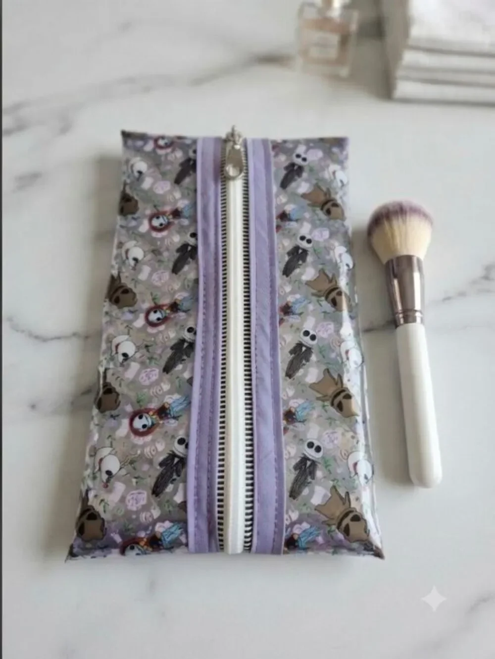 Skeleton, ragdoll, & boogieman, with flowers; clear vinyl makeup brush pouch